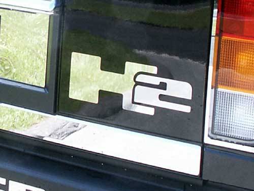 QAA - Hummer H2 2003-2009, 4-door, SUV (2 piece Stainless Steel Letter Graphics Rear Deck "H2" Emblem ) HV43020 QAA