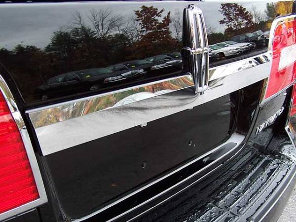 QAA - Lincoln Navigator 2007-2014, 4-door, SUV (1 piece Stainless Steel License Bar, Above plate accent Trim with Logo Cut Out ) LB47655 QAA