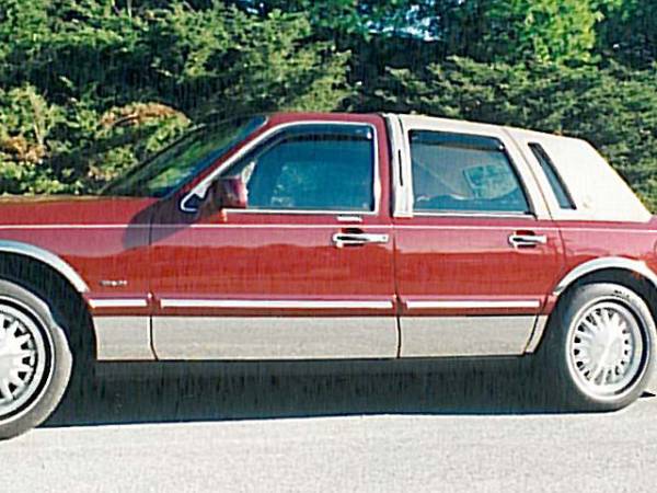 QAA - Lincoln Town Car 1995-1997, 4-door, Sedan (8 piece Stainless Steel Rocker Panel Trim, Full Kit 8.063" - 8.563" tapered Width Spans from the bottom of the molding to the bottom of the door.) TH35680 QAA