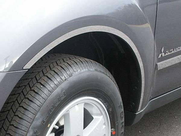 QAA - Mitsubishi Outlander 2007-2009, 4-door, SUV (4 piece Stainless Steel Wheel Well Accent Trim With 3M adhesive installation and black rubber gasket edging.) WQ27010 QAA
