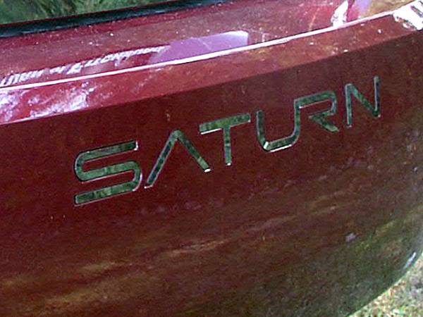 QAA - Saturn Ion 2005-2007, 4-door, Sedan (5 piece Stainless Steel "SATURN" Rear Bumper Letter Inserts ) SGR45410 QAA