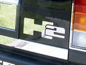 Hummer H2 2003-2009, 4-door, SUV (2 piece Stainless Steel Letter Graphics Rear Deck "H2" Emblem ) HV43020 QAA